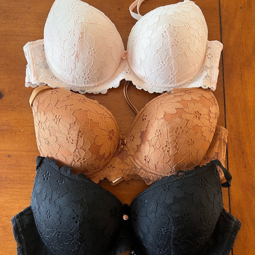 THREE push up bras